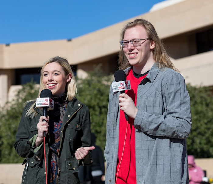 Travis Peden, student Lead Android Developer, speaking to a reporter in Texas.