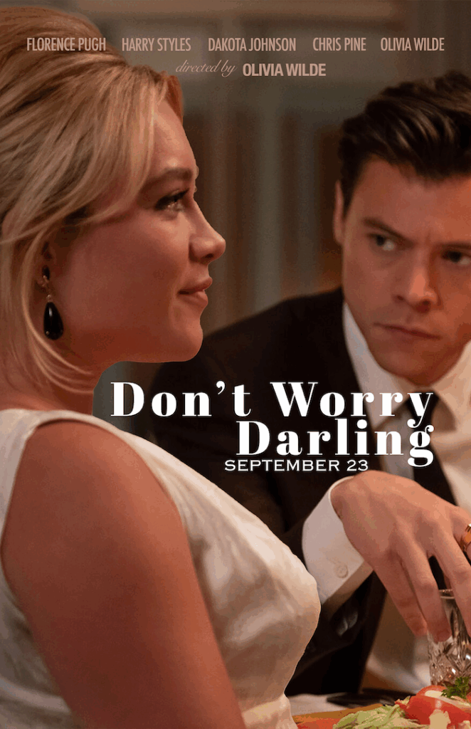 Movie poster for the film, Don't Worry Darling. In this poster, the character portrayed by Harry Styles glares at Florence Pugh's character over a dinner table.